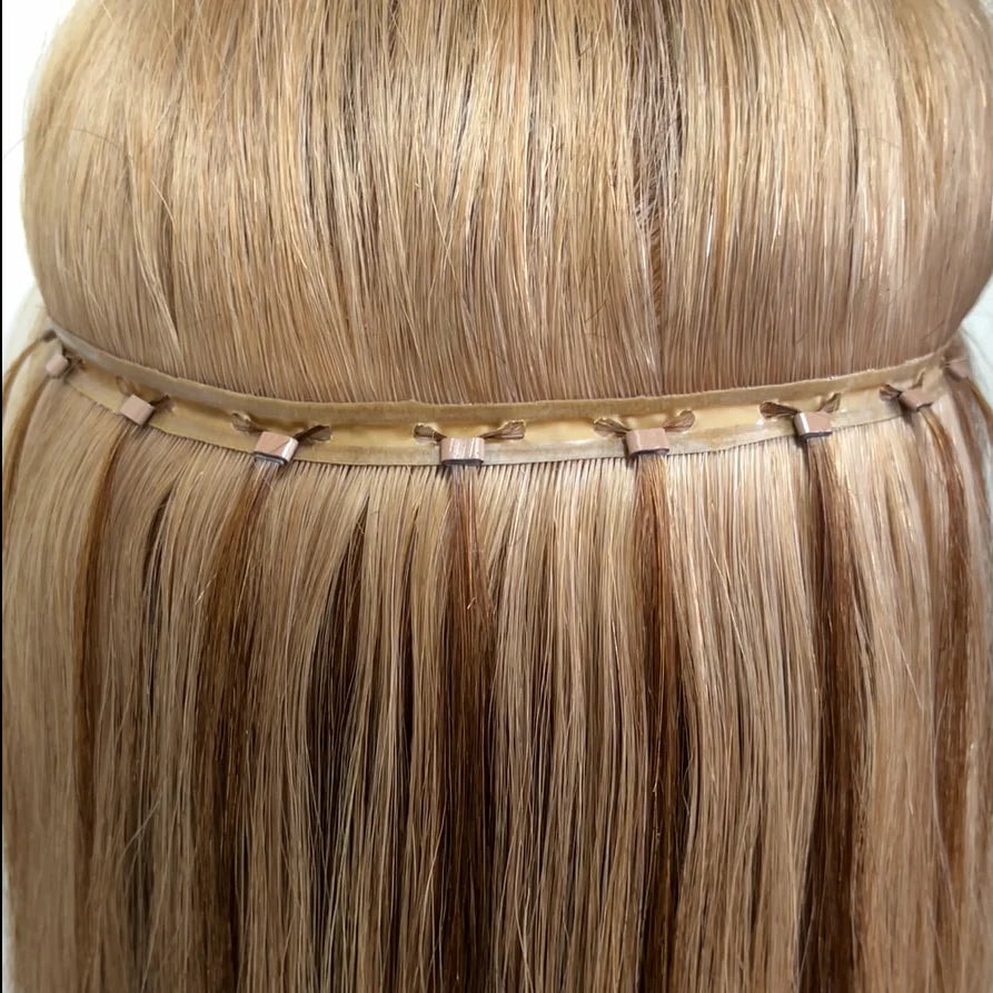 Beaded individual hair extensions — seamless install at Studio 940 Decatur TX